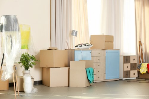 Furniture removals team handling household items in Dulwich