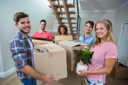 Student removals team helping with boxes and furniture in Dulwich