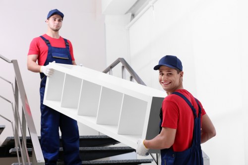 Specialist team handling a piano removal in Dulwich with careful lifting and protection