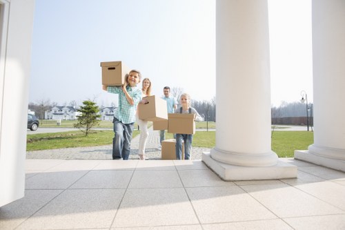 Local moving team helping with boxes and furniture in Dulwich
