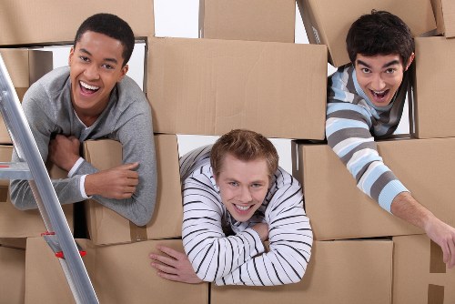 Customer complaint being logged by a removal company staff member