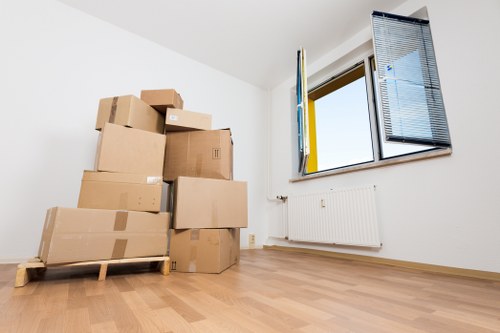 Boxes and furniture being unloaded at a Dulwich apartment building