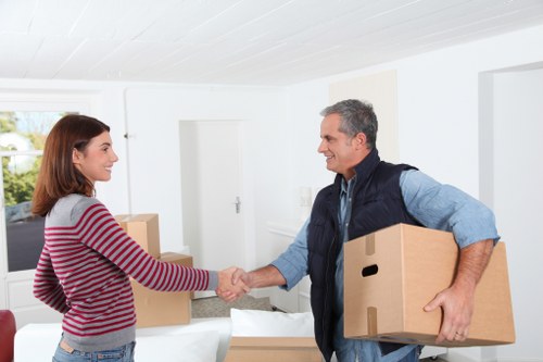 Unpacking boxes in a Dulwich property after relocation