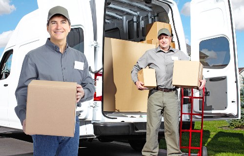 House removal service handling boxes and furniture in South London