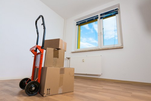 A professional relocation team managing access and loading for a Dulwich business