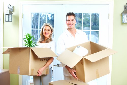 Commercial relocation team handling office furniture in a South London area